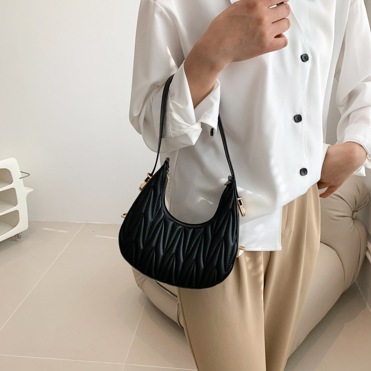 Gepolsterte Mini-Handtasche