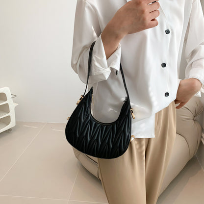 Gepolsterte Mini-Handtasche