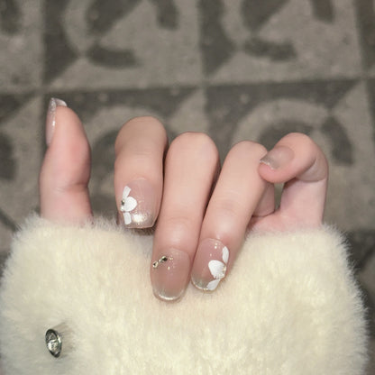 Dekoratives Press-On-Nagelset mit elegantem Blattdesign Brehn