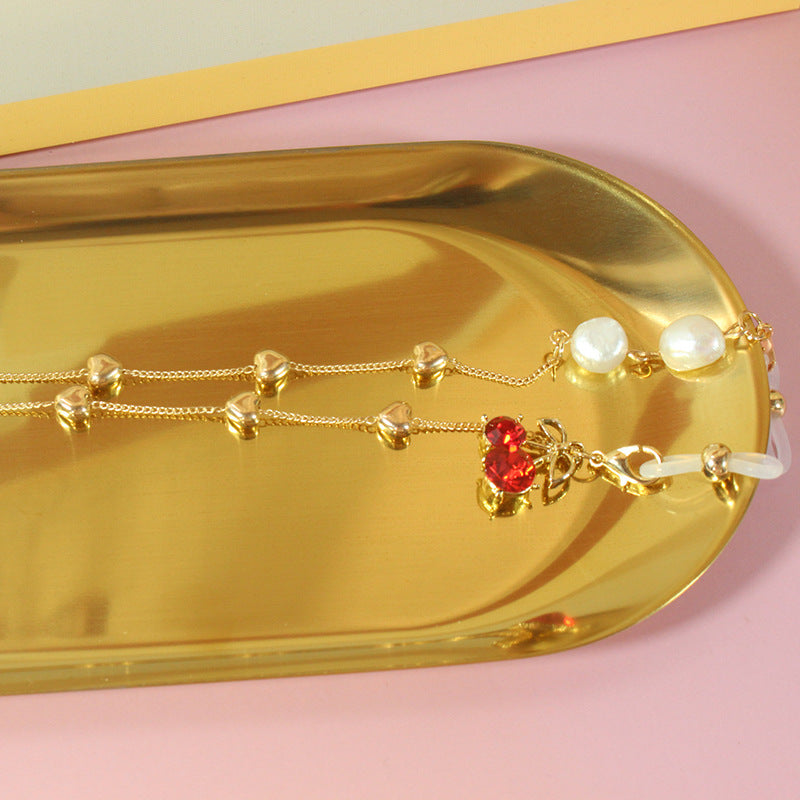 Elegantes Schmuckband mit Perlen und Silbernen Akzenten Brehn