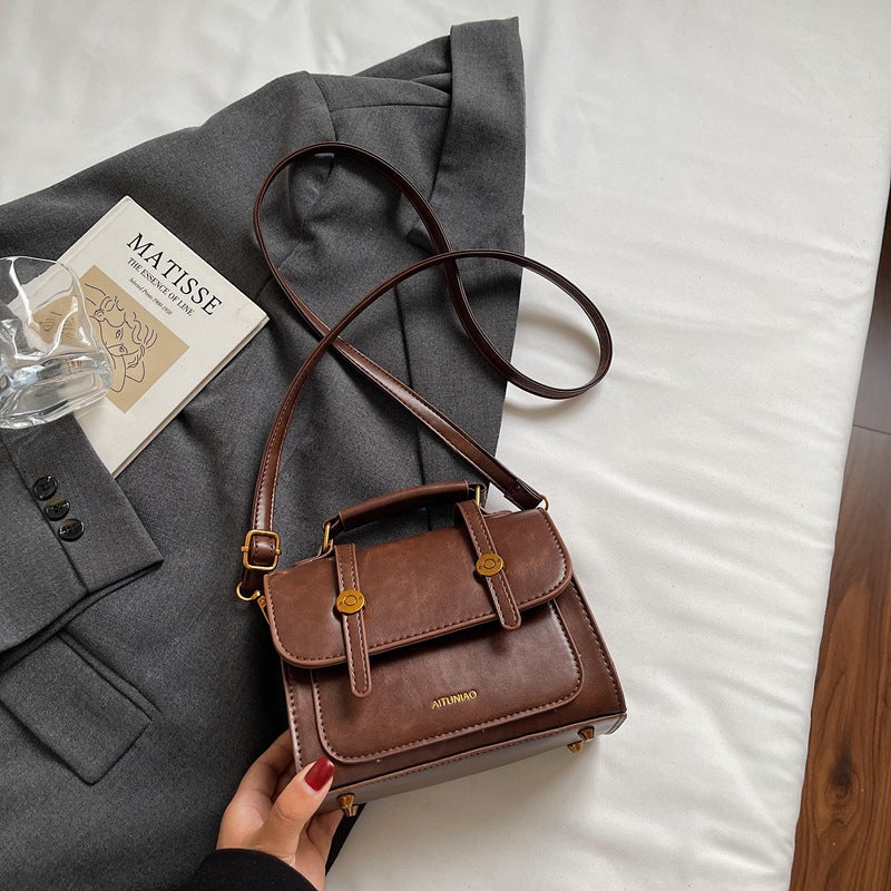 Kompakte Lederhandtasche Brehn