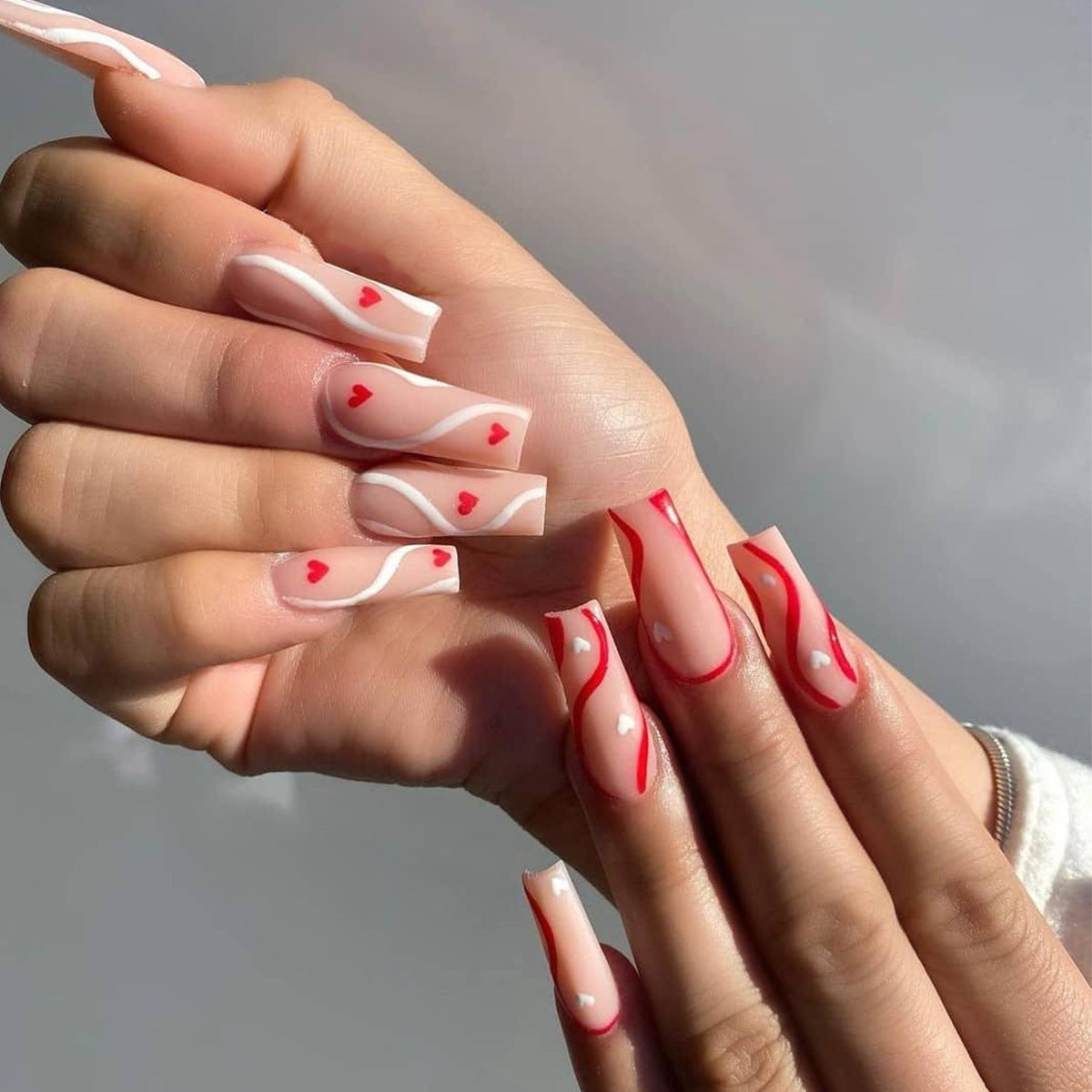 Künstliche Nailart mit Herzen Brehn