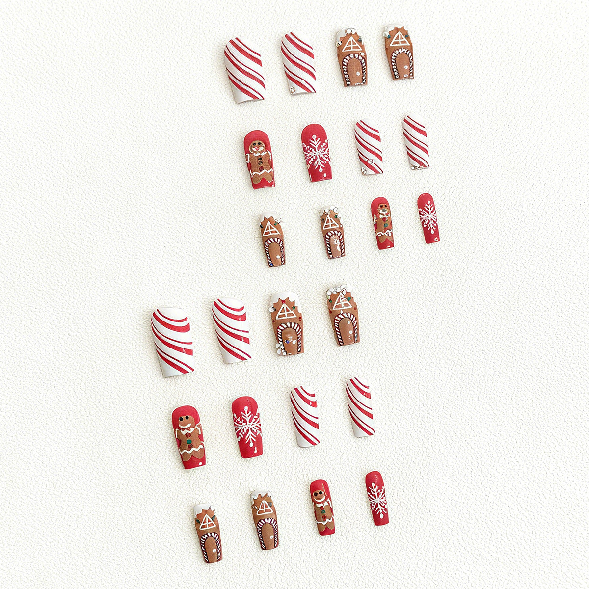 Kunstnagelset für die Winterzeit mit originellen Weihnachtsmotiven Brehn