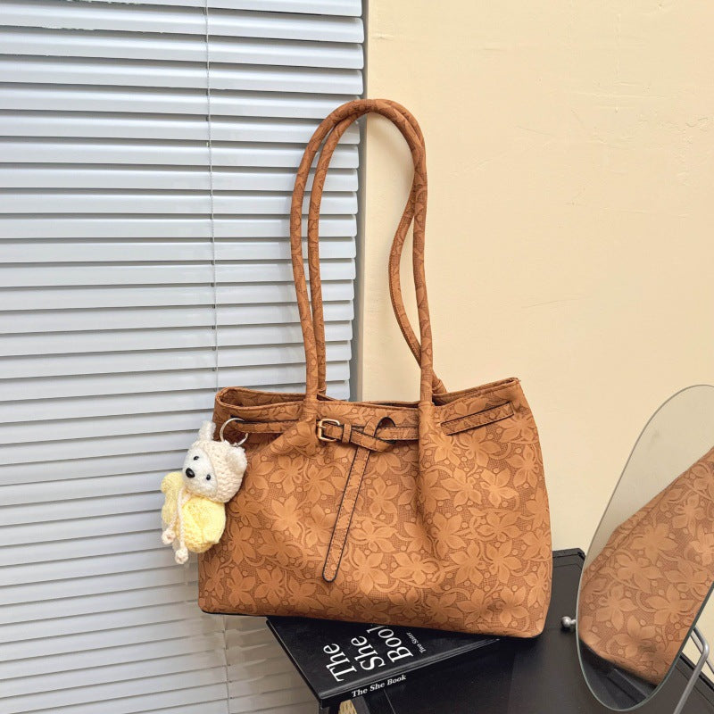 Elegante Handtasche mit floralem Muster