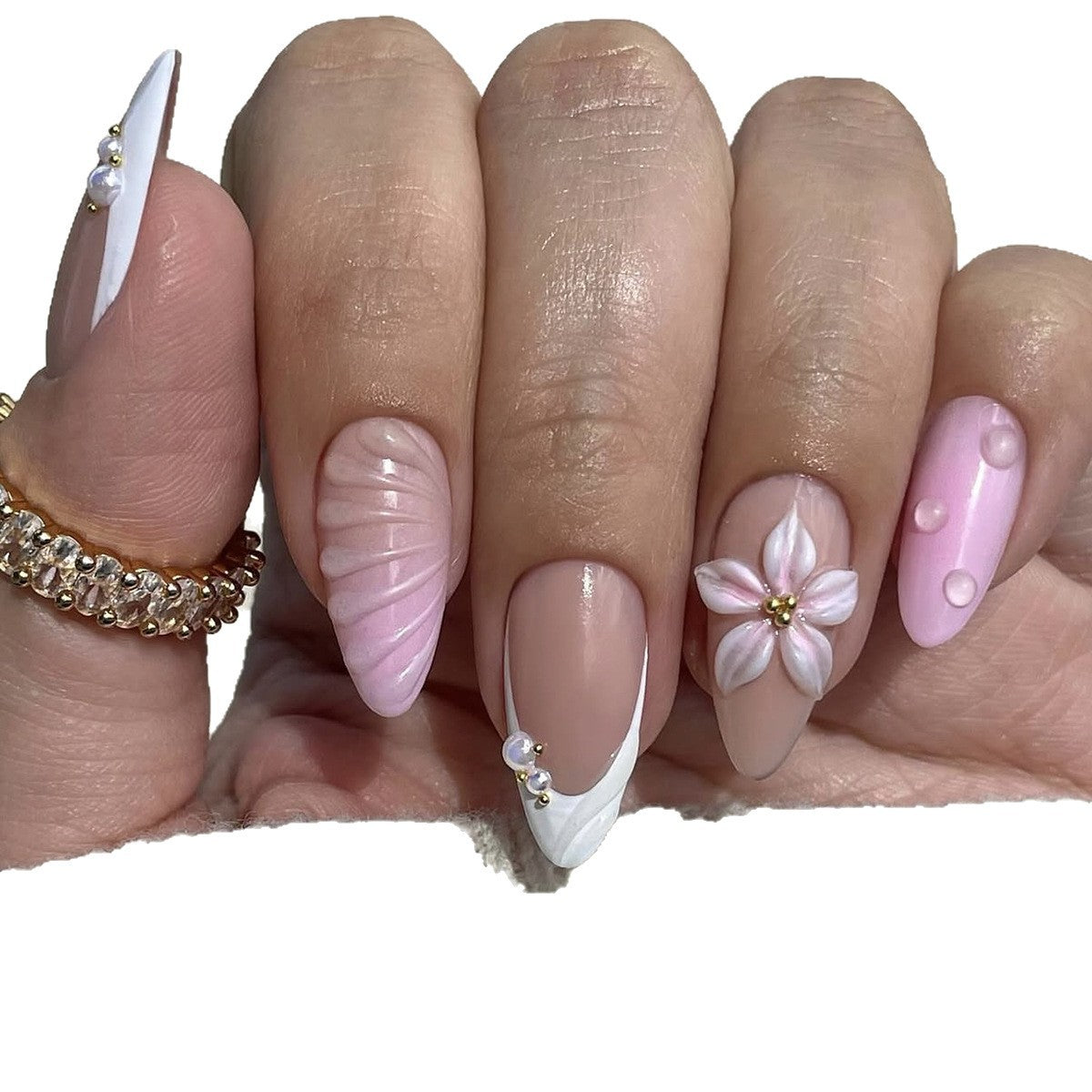 Kreatives Kunstnagelset mit floralem und schimmerndem Design Brehn