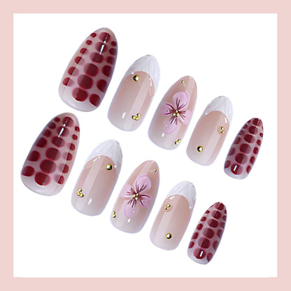 Kunstnagelset mit eleganten Blüten- und Glitzerakzenten Brehn