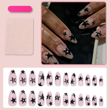 Kunstnagelset mit glamourösen Sternen und funkelnden Akzenten Brehn