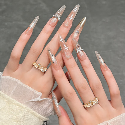 Elegante Stiletto Press-On-Nagelverlängerungen mit Edelsteinakzenten Brehn
