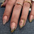 Dekoratives Druck-Nagelkunst-Set mit goldenen Akzenten Brehn