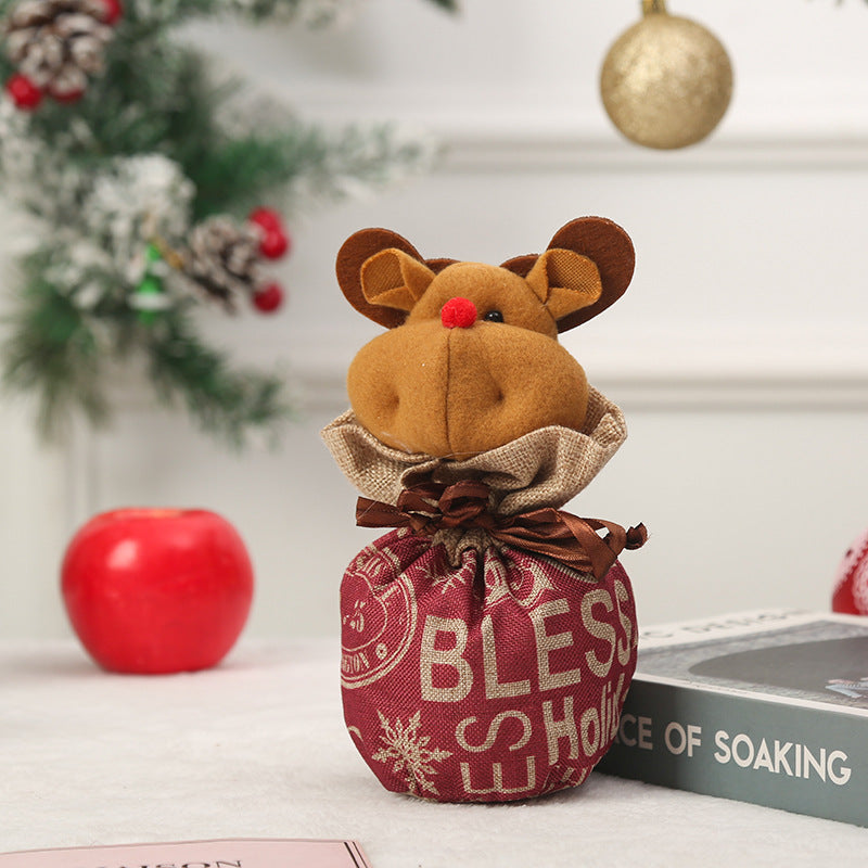 Niedlicher Weihnachtsgnom mit Geschenkesack Brehn