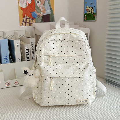 Verspielter gepunkteter Rucksack
