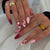 Kunstvolle Nagelset mit festlichem Sternen-Design Brehn