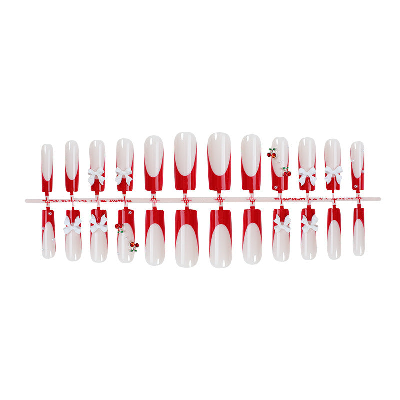 Kreatives Nagelset mit festlichen Kirschmotiven Brehn