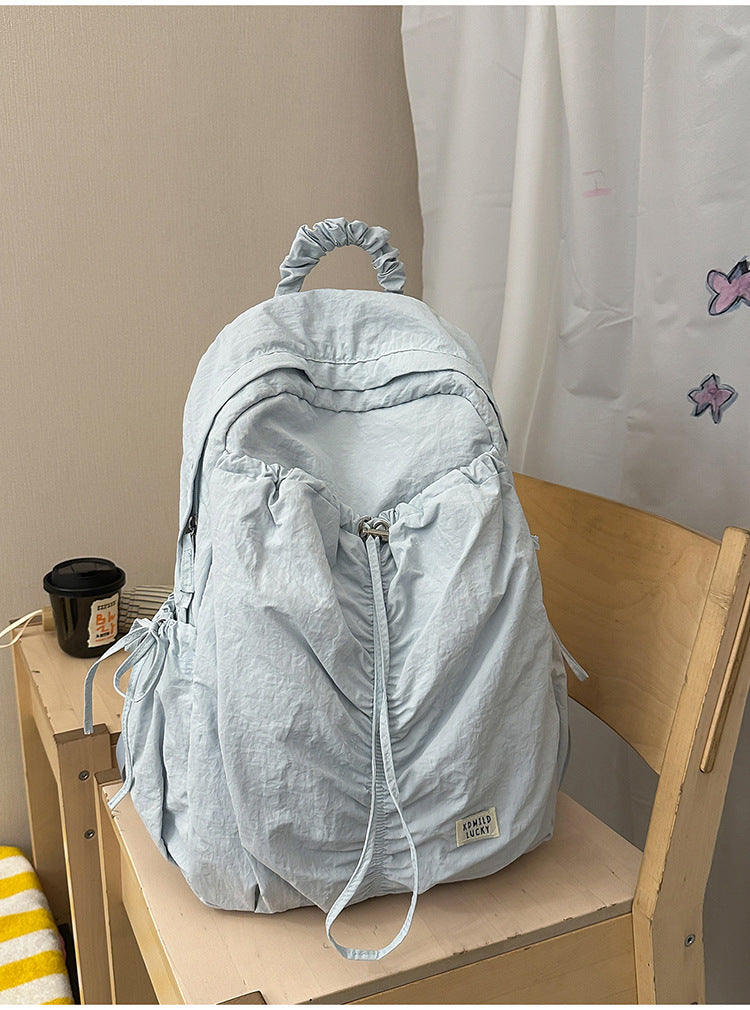 Lässiger zerknitterter Stoff-Schulrucksack
