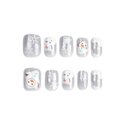 Kunstvolle Nagelkunst mit Schnee- und Weihnachtsmotiven Brehn
