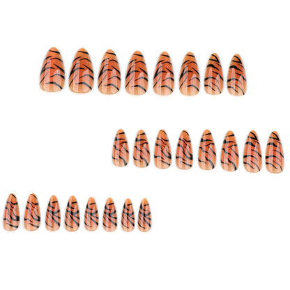 Kunstvolle Stiletto-Nägel mit kreativem Tigerstreifen-Design Brehn