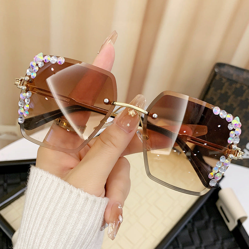 Damen Sonnenbrille mit extravagantem Strassrahmen Brehn