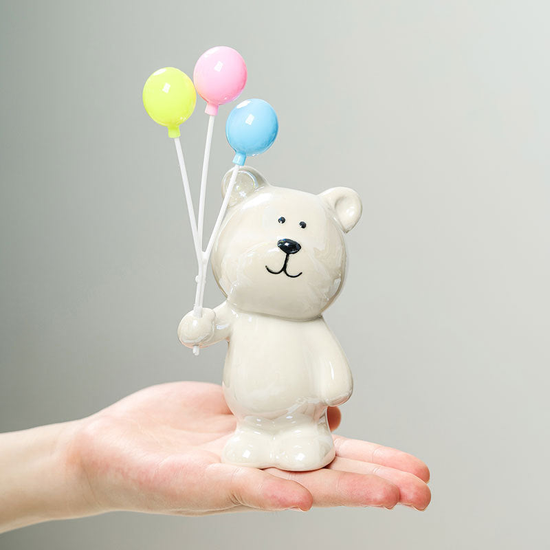 Süße Keramikbärenfigur mit Luftballons Brehn