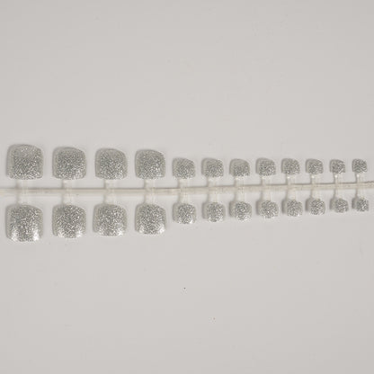 Glitzernde Press-On Fußnagelkunst Brehn