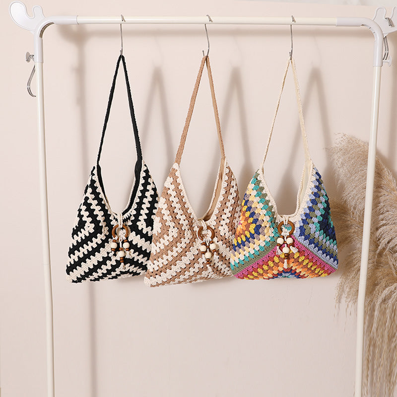 Damen Handtasche mit kunstvollem Flechtmuster Brehn