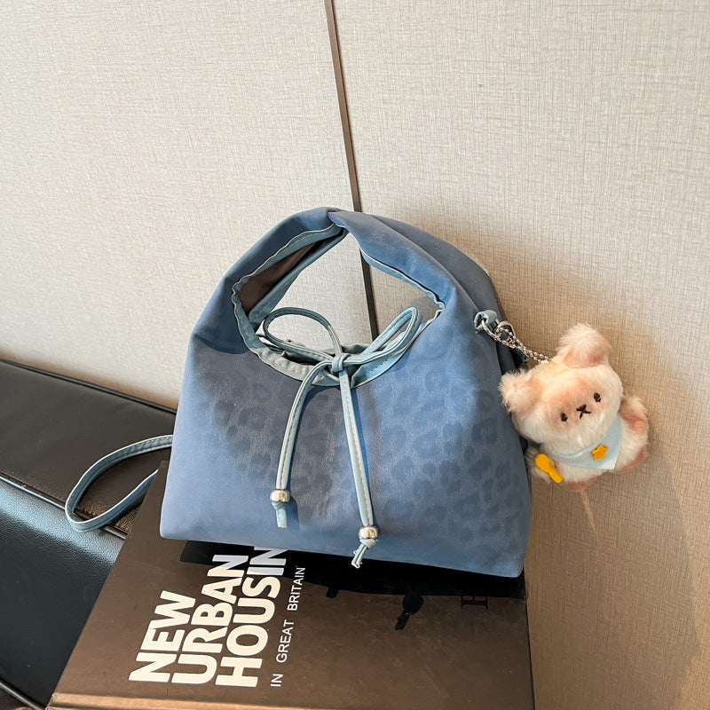 Stylische und funktionale Drawstring-Handtasche Brehn