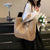 Geflochtene Strandtasche mit Fransigem Detail Brehn