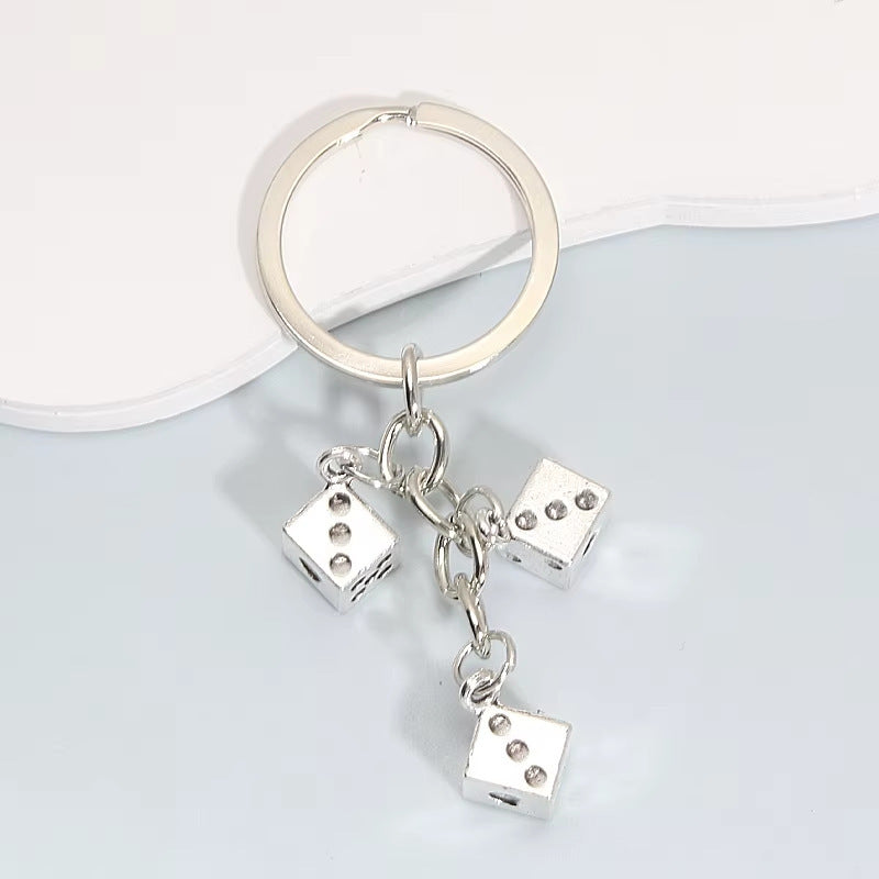 Würfel-inspirierter Charm-Schlüsselanhänger Brehn