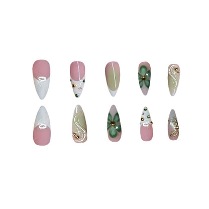 Künstlerisches Press-On Nageldesign mit floralen Elementen Brehn