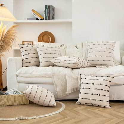 Dekorativer quadratischer Kissenbezug aus Baumwoll-Optik mit vertikalem Knotensaum und verdezippertem Reißverschluss