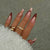 Stiletto Press-On Nagelkunst Set mit eleganten goldenen Akzenten Brehn