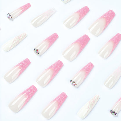 Kunstvolle Stiletto-Nägel mit Glitzer- und Schneeflockendesign Brehn
