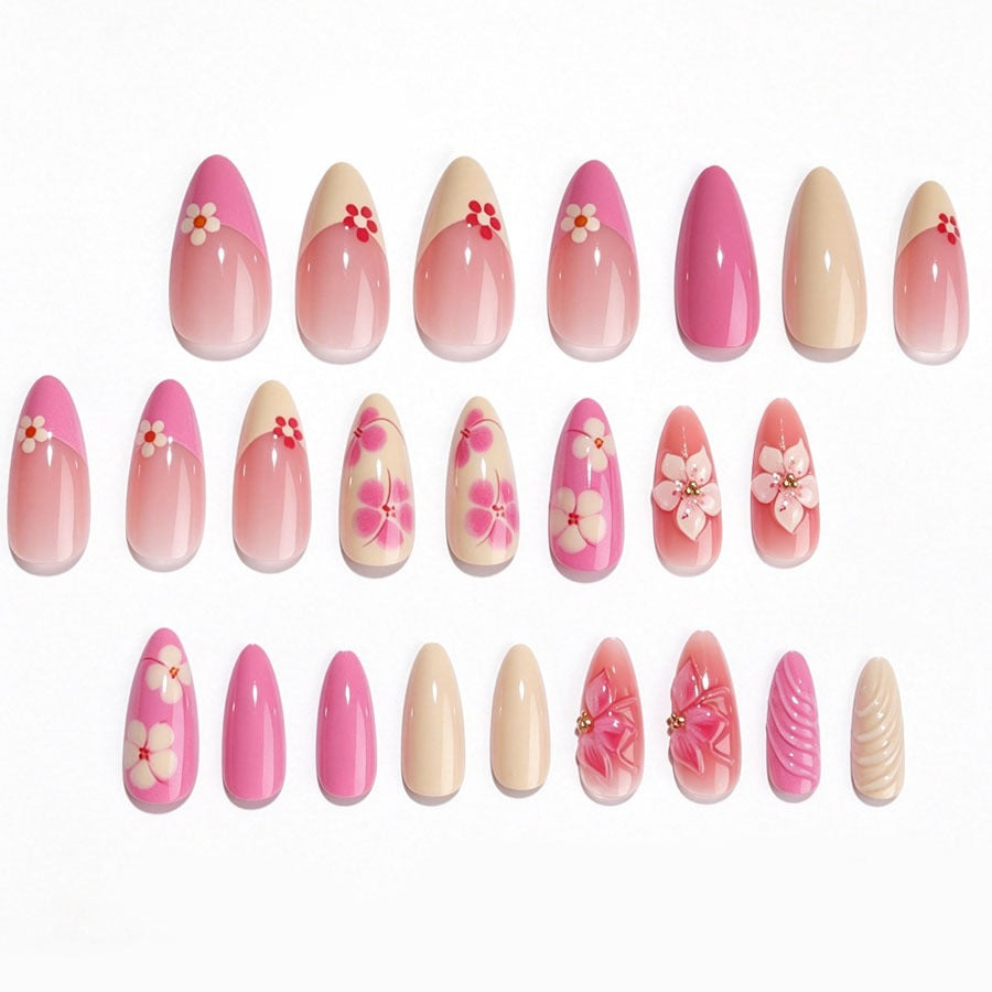 Kunstnagelset mit floralen Akzenten und Glitzerelementen Brehn