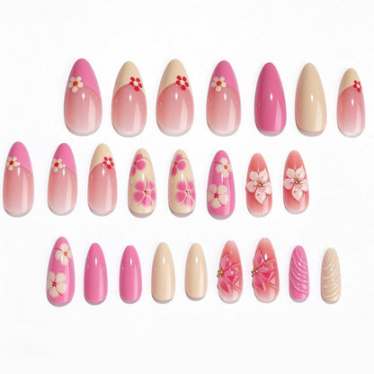 Kunstnagelset mit floralen Akzenten und Glitzerelementen Brehn