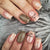Kunstnagelset mit funkelndem Glitzer und zarten Designs Brehn