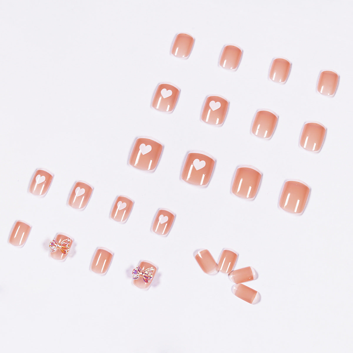 Nagelkunst mit Herz- und Schmetterlingsmotiven Brehn