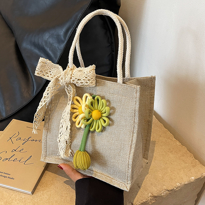 Blumenverzierte Tasche