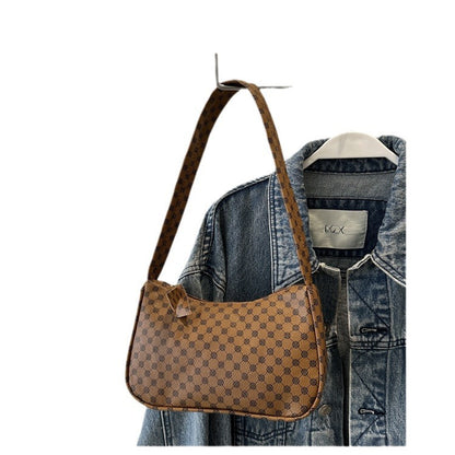 Stylische karierte Schultertasche