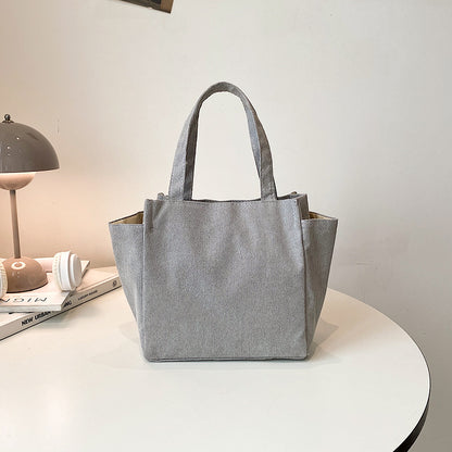 Texturierte Cordura-Tote-Tasche mit niedlichem Plüsch-Anhänger