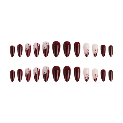 Kunstvolle Nagelspitzen mit Tropfen-Design Brehn
