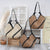 Handtasche Aus Geflochtenem Naturmaterial mit Kontrastierenden Ledergriffen Brehn