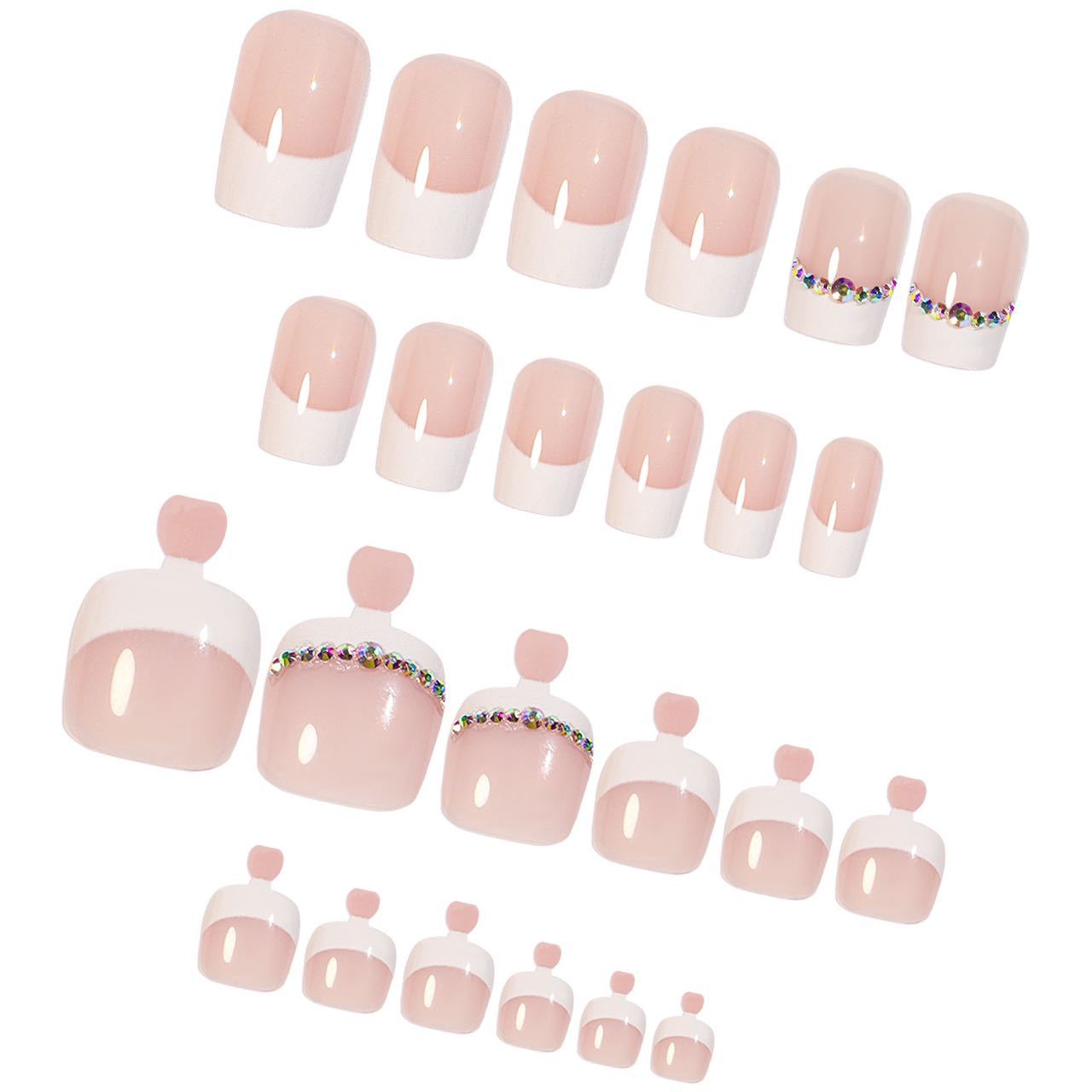 Kunstnagelset mit elegantem Französisch-Muster und Strassverzierungen Brehn