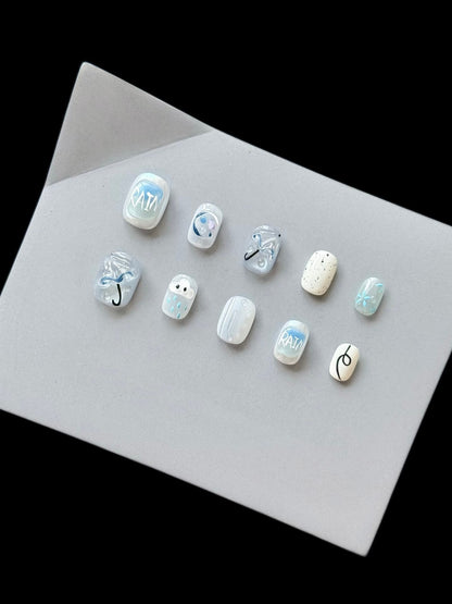 Künstlerisches Press-On Nagelset mit Regen-Thema