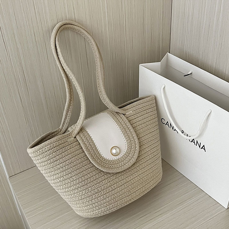Damen Handtasche aus geflochtenem Naturmaterial mit elegantem Verschluss Brehn