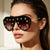 Damen trendige Sonnenbrille mit auffälligen Metallelementen Brehn