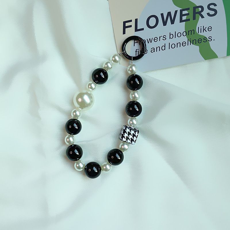 Elegante Perlen- und schwarze Perlen-Charm-Armband Brehn
