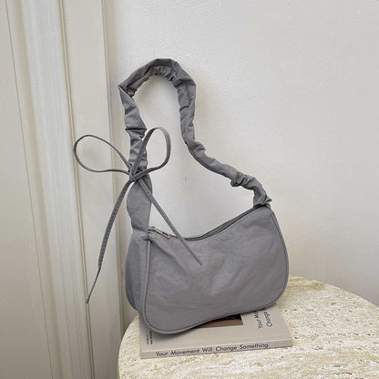 WoTexturiertes Stoff Sling Bag Brehn
