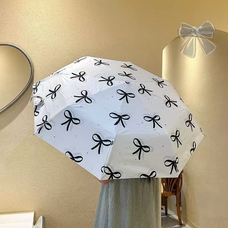 Damen Faltbarer Regenschirm mit elegantem Schleifenmotiv Brehn