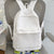 Stylischer Rucksack mit gepunktetem Muster