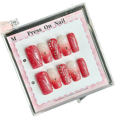 Dekorativer Press-On Nagelset mit Blumen- und Edelsteinakzenten  1791773770
