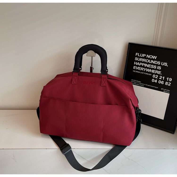 Multifunktionale Reisetasche mit verstellbarem Schultergurt